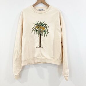 Chic Cream Sweatshirt with Palm Tree Design
